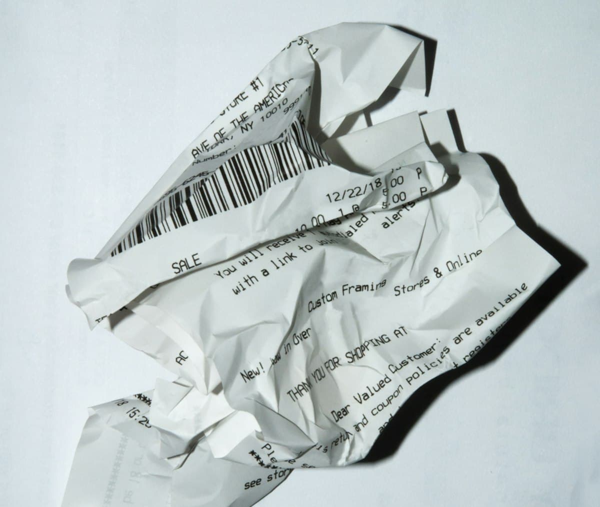Official receipt on a white surface showing the VAT charged on a purchase